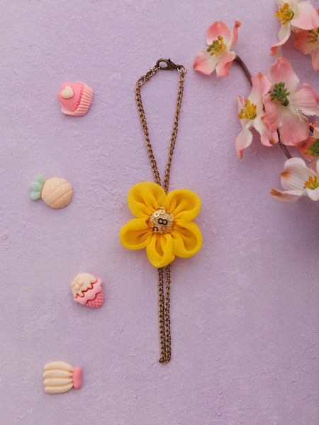 Chain Bracelet with vibrant flower and Sequence Center- Yellow