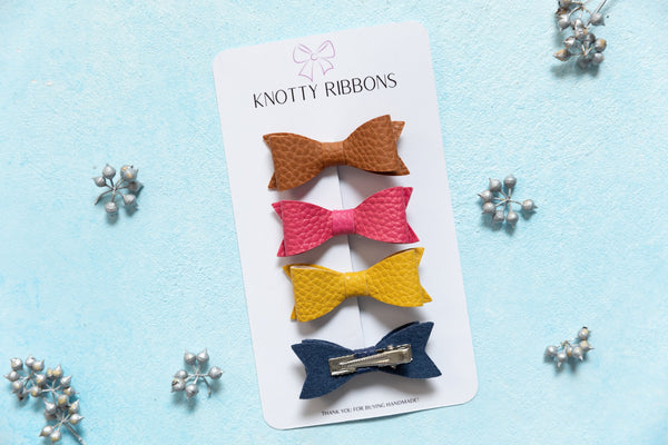 Petite Leather Mini Bow Hair Clip Set- Brown, Barbie Pink, Yellow & Navy Blue